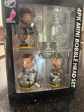 The Boston Bruins 2001 Stanley Cup Champions Mini Bobblehead Set is a collectible item featuring the team members Chara and Thomas and Lucic