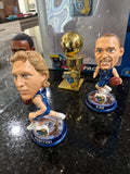 mini bobblehead set featuring Dirk Nowitzki of the Dallas Mavericks, a team that won the NBA championship in 2011.