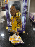 Andrew Bynum bobblehead from the 2009 Los Angeles Lakers NBA championship team. This collectible item is officially licensed by the National Basketball Association (NBA)