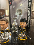 The Boston Bruins 2001 Stanley Cup Champions Mini Bobblehead Set is a collectible item featuring the team members Chara and Thomas and Lucic