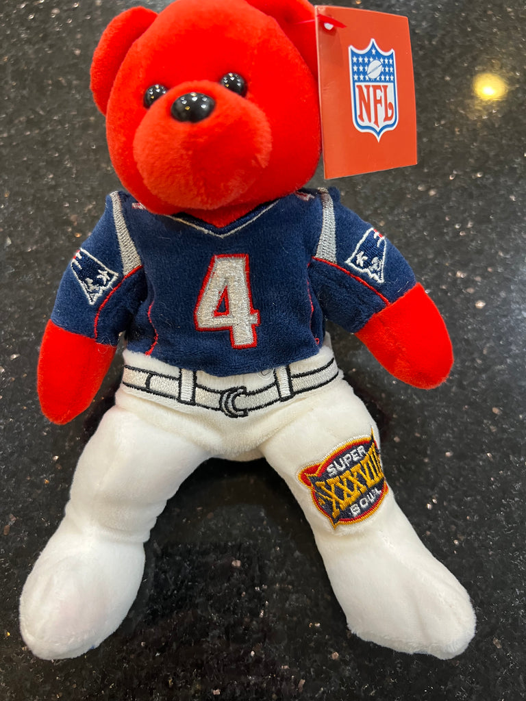 plush bear featuring Adam Vinatieri from the New England Patriots, commemorating their Super Bowl XXXVIII victory. Officially licensed by the National Football League (NFL)