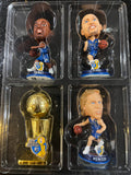 mini bobblehead set featuring Dirk Nowitzki of the Dallas Mavericks, a team that won the NBA championship in 2011.