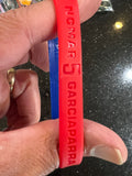 Chicago Cubs MLB Nomar Garciapara Mylar Wristband is a stylish bracelet featuring the iconic player's name and team logo. Made by Forever Collectible