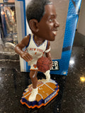 The product is a rare action bobblehead of Amar'e Stoudemire, a former player for the New York Knicks in the NBA. This is an officially licensed collectible by Forever Collectibles