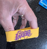 Los Angeles Lakers extra wide NBA team logo silicone wristband bracelet.