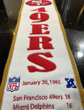 San Francisco 49ers beautifully crafted NFL Super Bowl 19 Heritage Banner. Made with embroidered wool and measuring 8" x 32"