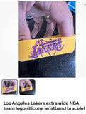 Los Angeles Lakers extra wide NBA team logo silicone wristband bracelet.