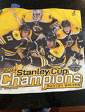 Boston Bruins 2011 Stanley Cup Champions player team towel mini.

Have it framed or just hang from the wall.