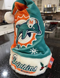 Miami Dolphins Adult NFL plush NFL big logo holiday swirl Santa hat by Foco Show off your team spirit with this festive accessory