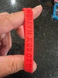 Boston Red Sox MLB Adult Mylar Wristbands Bracelets 3pk is a set of three wristbands featuring the iconic Boston Red Sox team logo and colors. Officially licensed by Major League Baseball (MLB)