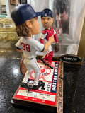 The Boston Red Sox MLB Jason Varitek & Curt Schilling Duel Ticket Base Bobblehead is a limited edition collectible commemorating
