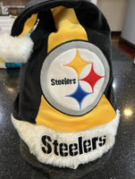 Pittsburgh Steelers NFL plush Color Block team logo santa hat from Forever Collectibles. This festive hat features the iconic Steelers logo