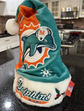 Miami Dolphins Adult NFL plush NFL big logo holiday swirl Santa hat by Foco Show off your team spirit with this festive accessory