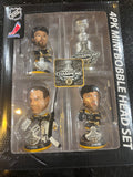 The Boston Bruins 2001 Stanley Cup Champions Mini Bobblehead Set is a collectible item featuring the team members Chara and Thomas and Lucic