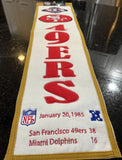 San Francisco 49ers beautifully crafted NFL Super Bowl 19 Heritage Banner. Made with embroidered wool and measuring 8" x 32"