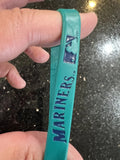 Seattle Mariners adult silicone MLB logo wristband.

New in original package.