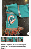 Miami Dolphins with this 65-inch plush team logo scarf. This two-sided scarf features the vibrant team color and the official NFL team logo