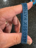 Boston Red Sox MLB Adult Mylar Wristbands Bracelets 3pk is a set of three wristbands featuring the iconic Boston Red Sox team logo and colors. Officially licensed by Major League Baseball (MLB)