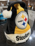 Pittsburgh Steelers NFL plush Color Block team logo santa hat from Forever Collectibles. This festive hat features the iconic Steelers logo