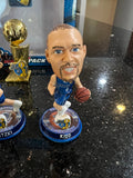 mini bobblehead set featuring Dirk Nowitzki of the Dallas Mavericks, a team that won the NBA championship in 2011.