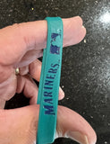 Seattle Mariners adult silicone MLB logo wristband.

New in original package.
