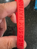 Boston Red Sox MLB Adult Mylar Wristbands Bracelets 3pk is a set of three wristbands featuring the iconic Boston Red Sox team logo and colors. Officially licensed by Major League Baseball (MLB)
