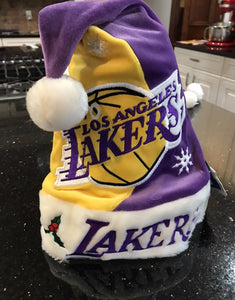Los Angeles Lakers NBA plush team logo adult size santa hat.

New with tags