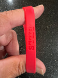 set of three adult wristbands bracelets featuring the Buffalo Bills NFL team logo and colors.