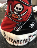 Tampa Bay Buccaneers plush swirl adult santa hat.

New with tags