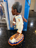 The product is a rare action bobblehead of Amar'e Stoudemire, a former player for the New York Knicks in the NBA. This is an officially licensed collectible by Forever Collectibles