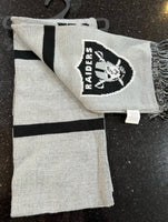 Oakland Raiders amazing 65-inch adult team logo scarf. This two-sided scarf features the team's logo on both sides