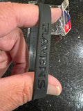 three adult-sized wristbands featuring the Baltimore Ravens NFL team logo, designed by Forever Collectibles for fans of the National Football League