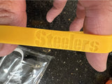 Pittsburgh Steelers super Bowl 40 champions 3pk silicone bracelets wristbands.
Rare item
3 commemorative bracelets new never used in original package.

Team colors