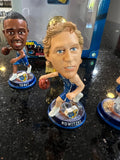 mini bobblehead set featuring Dirk Nowitzki of the Dallas Mavericks, a team that won the NBA championship in 2011.