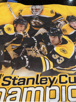 Boston Bruins 2011 Stanley Cup Champions player team towel mini.

Have it framed or just hang from the wall.