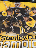 Boston Bruins 2011 Stanley Cup Champions player team towel mini.

Have it framed or just hang from the wall.