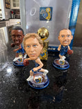mini bobblehead set featuring Dirk Nowitzki of the Dallas Mavericks, a team that won the NBA championship in 2011.