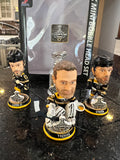 The Boston Bruins 2001 Stanley Cup Champions Mini Bobblehead Set is a collectible item featuring the team members Chara and Thomas and Lucic