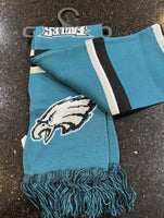 Philadelphia Eagles with this stunning 65-inch plush team logo scarf. This two-sided scarf features the Eagles' logo on both sides