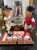 The Boston Red Sox MLB Jason Varitek & Curt Schilling Duel Ticket Base Bobblehead is a limited edition collectible commemorating