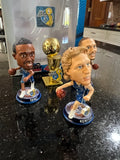 mini bobblehead set featuring Dirk Nowitzki of the Dallas Mavericks, a team that won the NBA championship in 2011.