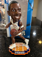 The product is a rare action bobblehead of Amar'e Stoudemire, a former player for the New York Knicks in the NBA. This is an officially licensed collectible by Forever Collectibles