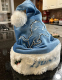Detroit Lions NFL big logo plush Solid Blue santa hat for adults. Perfect for fans of the National Football League (NFL)