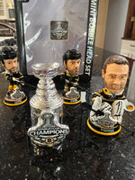 The Boston Bruins 2001 Stanley Cup Champions Mini Bobblehead Set is a collectible item featuring the team members Chara and Thomas and Lucic