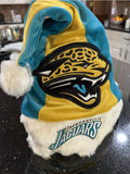 Jacksonville Jaguars team logo colorblock plush adult size Santa hat.