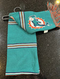 Miami Dolphins with this 65-inch plush team logo scarf. This two-sided scarf features the vibrant team color and the official NFL team logo