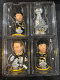 The Boston Bruins 2001 Stanley Cup Champions Mini Bobblehead Set is a collectible item featuring the team members Chara and Thomas and Lucic