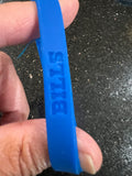 set of three adult wristbands bracelets featuring the Buffalo Bills NFL team logo and colors.