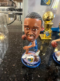 mini bobblehead set featuring Dirk Nowitzki of the Dallas Mavericks, a team that won the NBA championship in 2011.
