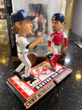 The Boston Red Sox MLB Jason Varitek & Curt Schilling Duel Ticket Base Bobblehead is a limited edition collectible commemorating